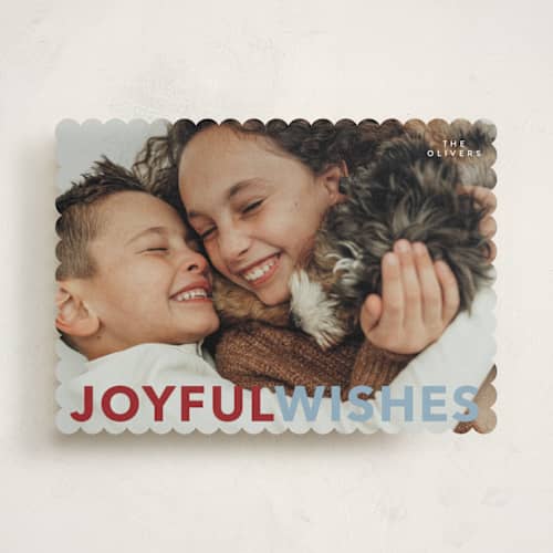This is a cardinal holiday photo cards with standard by Angela Thompson called most merry printing on recycled smooth signature in standard