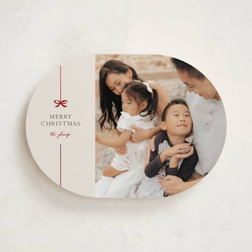 This is a poinsettia foil pressed holiday cards with foil pressed by Pixel and Hank called bow printing on recycled smooth signature in standard
