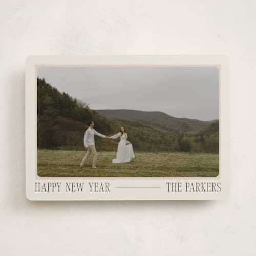 This is a cream photo christmas cards with standard by Robert and Stella called vintage postcard printing on recycled smooth signature in standard