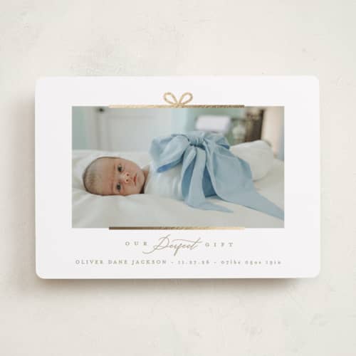 This is a frost babys first christmas with foil pressed by Creo Study called our perfect gift printing on recycled smooth signature in standard