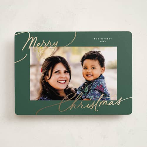 This is a spruce foil pressed holiday cards with foil pressed by Everett Paper Goods called evoke printing on recycled smooth signature in standard
