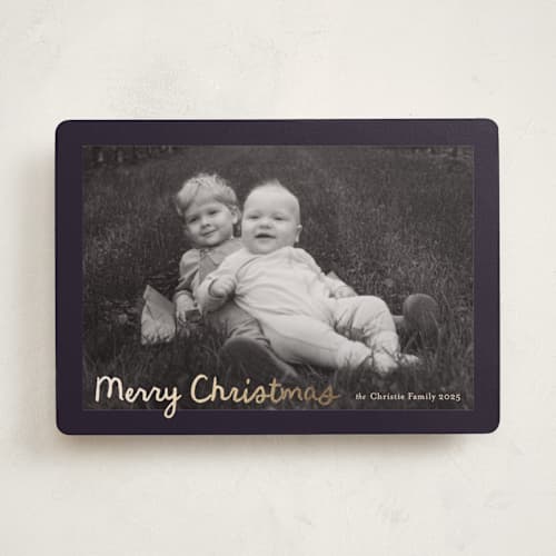 This is a midnight foil pressed holiday cards with foil pressed by Ani Somi called christmas pudding printing on recycled smooth signature in standard