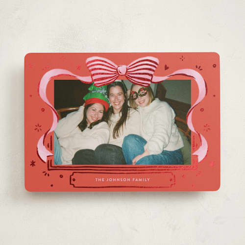 This is a stocking foil pressed holiday cards with foil pressed by Shannon Chen of Four Wet Feet Studio called a bow printing on recycled smooth signature in standard