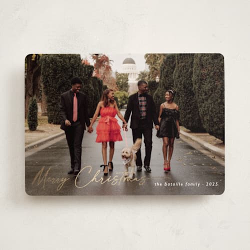 This is a ivory foil pressed holiday cards with foil pressed by Chris Griffith called holiday glee printing on recycled smooth signature in standard
