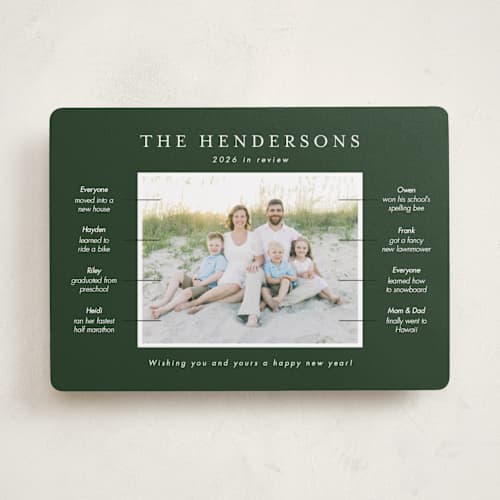 This is a pine new year photo cards with standard by Kristen Knechtel called our year in review printing on recycled smooth signature in standard