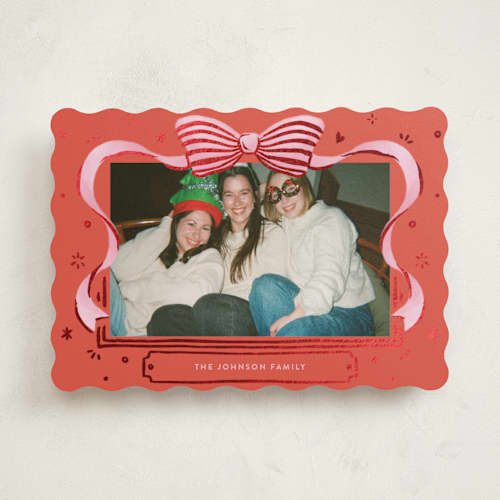 This is a stocking foil pressed holiday cards with foil pressed by Shannon Chen of Four Wet Feet Studio called a bow printing on recycled smooth signature in standard