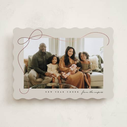 This is a putty foil pressed holiday cards with foil pressed by Lauren Chism called cascading bow printing on recycled smooth signature in standard