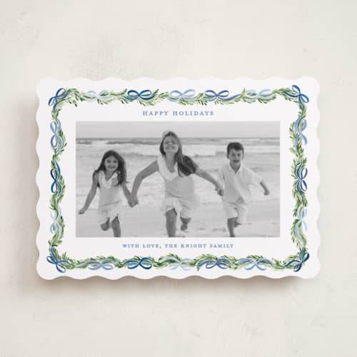 This is a frosted holiday photo cards with standard by Sarah Knight called boughs of bows printing on recycled smooth signature in standard