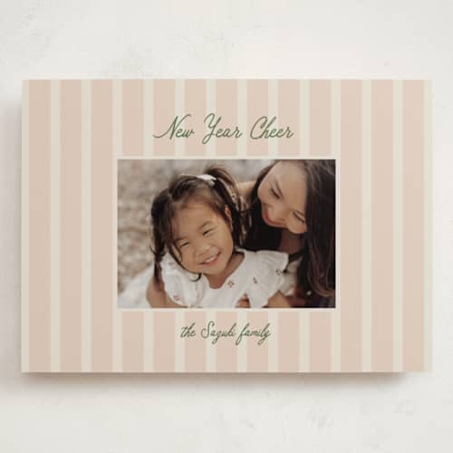 This is a salmon holiday photo cards with standard by Ellen Schlegelmilch called script & stripes printing on recycled smooth signature in grand