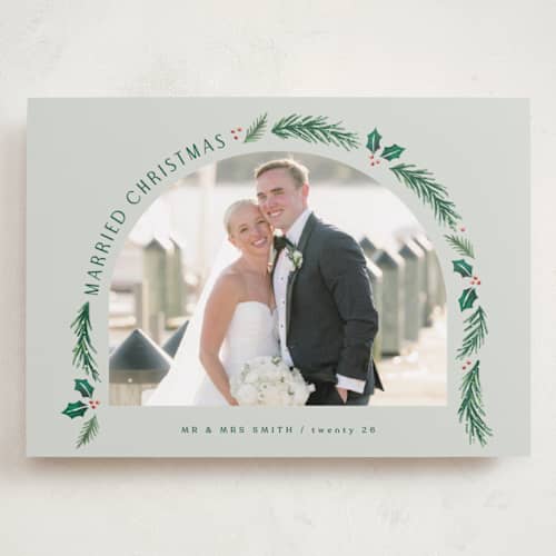 This is a sage holiday photo cards with standard by Hooray Creative called a married christmas printing on recycled smooth signature in grand