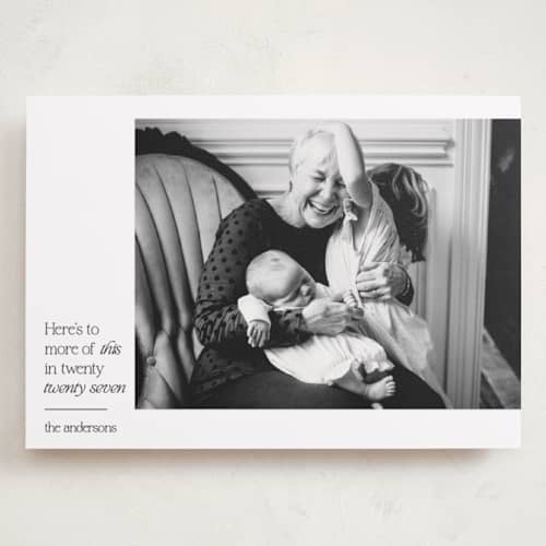 This is a ivory holiday photo cards with standard by Annie Shapiro called more of this printing on recycled smooth signature in grand