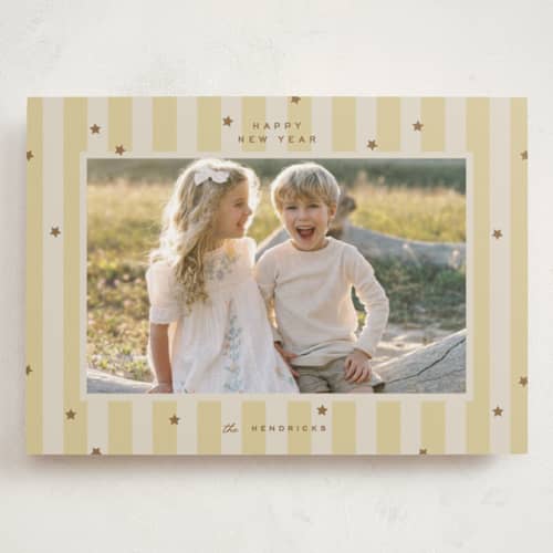 This is a butter holiday photo cards with standard by Ellen Schlegelmilch called stars & stripes printing on recycled smooth signature in grand