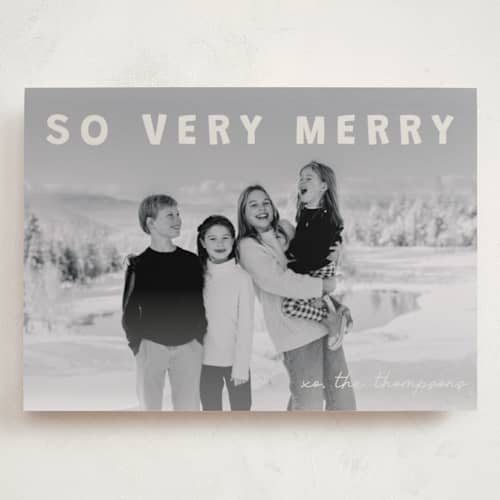 This is a cream holiday photo cards with standard by Jenny Millington called merry greeting printing on recycled smooth signature in grand