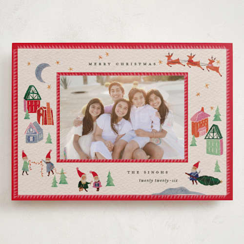 This is a santa holiday photo cards with standard by Julie Murray called north pole party printing on recycled smooth signature in grand