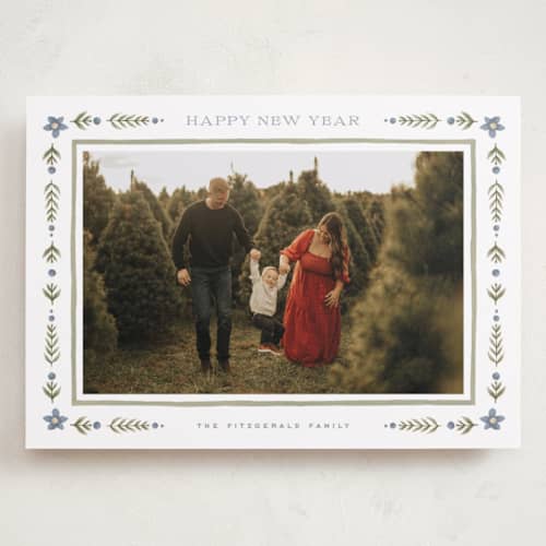 This is a juniper holiday photo cards with standard by Wildfield Paper Co called folk border printing on recycled smooth signature in grand