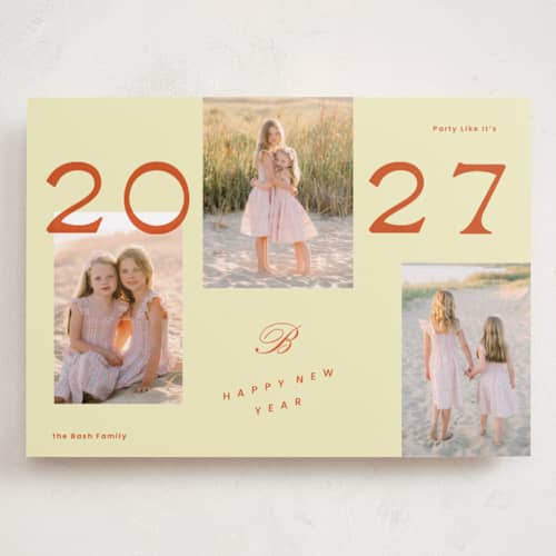 This is a buttercream holiday photo cards with standard by Rachel Cassel called a bold year printing on recycled smooth signature in grand