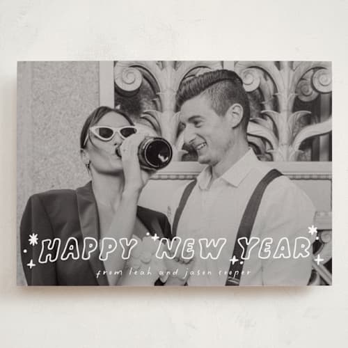 This is a starlight holiday photo cards with standard by Everett Paper Goods called pizazz printing on recycled smooth signature in grand