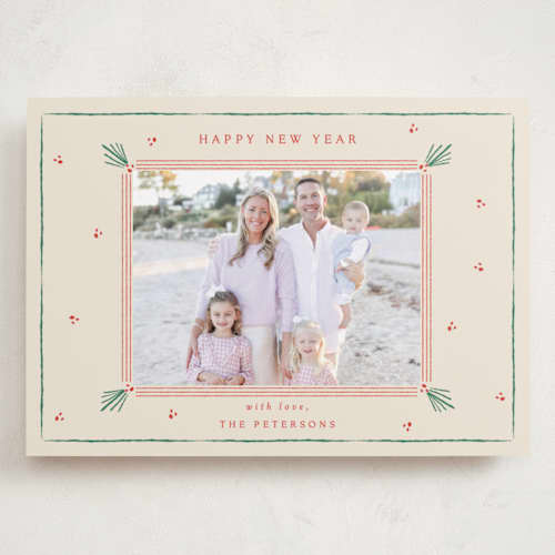 This is a holly holiday photo cards with standard by Sarah Rosenthal called holly tidings printing on recycled smooth signature in grand