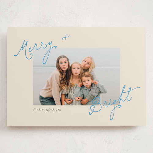 This is a electric blue holiday photo cards with standard by Morgan Kendall called topsy turvy printing on signature in grand
