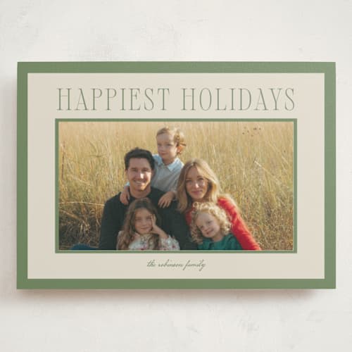 This is a mistletoe holiday photo cards with standard by Wildfield Paper Co called happiest! printing on signature in grand
