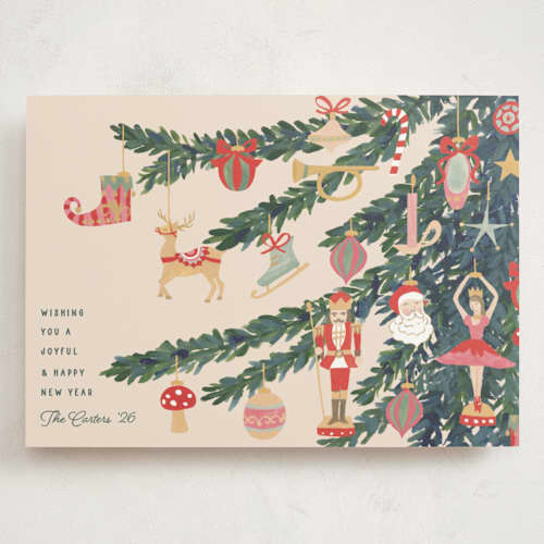 This is a champagne holiday photo cards with standard by Teju Reval called fun ornaments printing on signature in grand