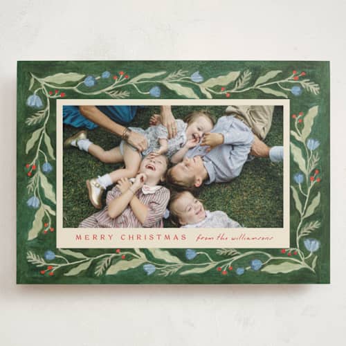 This is a pine holiday photo cards with standard by Amy Kross called verdant printing on signature in grand
