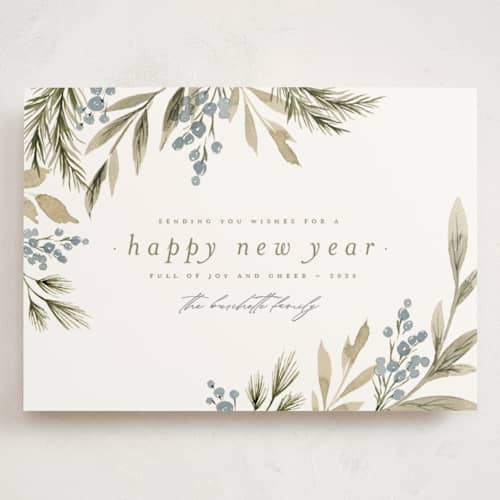 This is a juniper holiday photo cards with standard by Wildfield Paper Co called holly + cedar printing on signature in grand