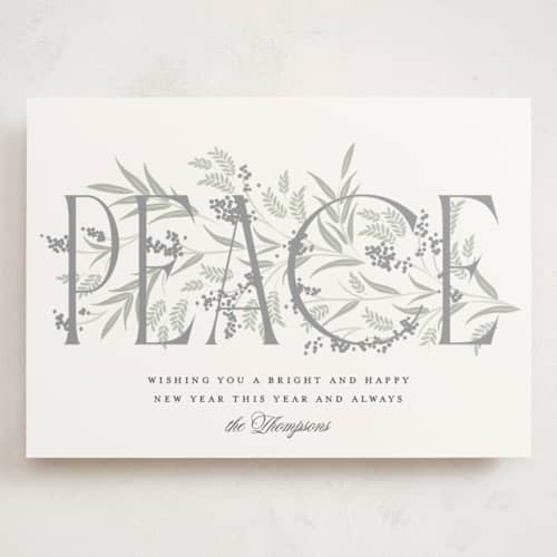 This is a snow holiday photo cards with standard by Robert and Stella called entwined peace printing on signature in grand
