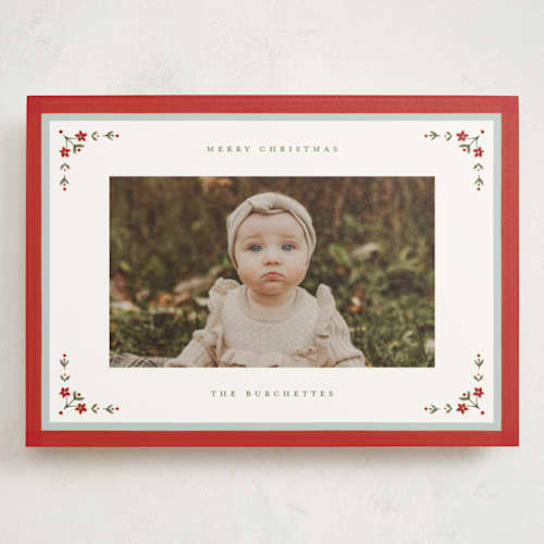 This is a holly berry holiday photo cards with standard by Wildfield Paper Co called laurel border printing on signature in grand