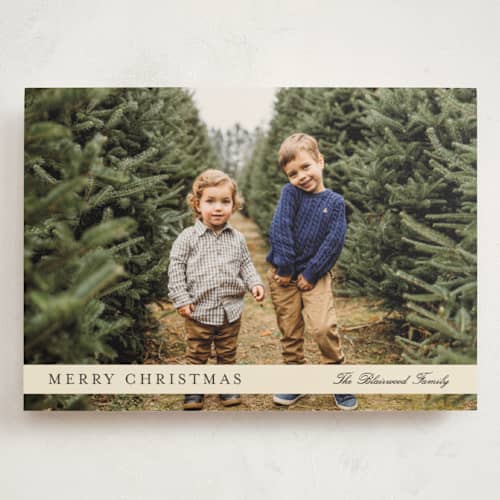 This is a cream holiday photo cards with standard by Baumbirdy called ribbon overlay printing on signature in grand