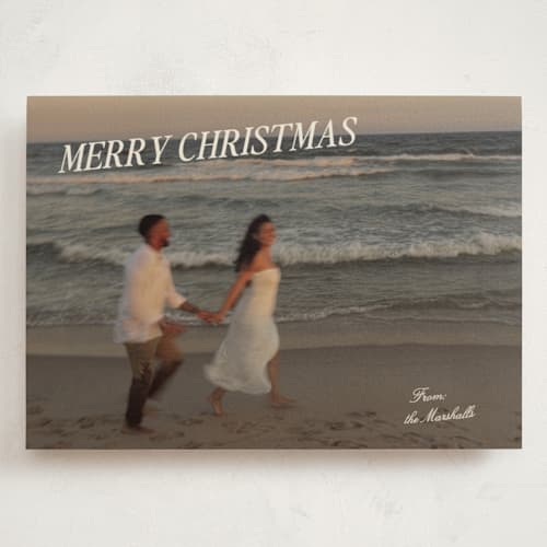 This is a cream holiday photo cards with standard by Ani Somi called coastal holiday printing on signature in grand