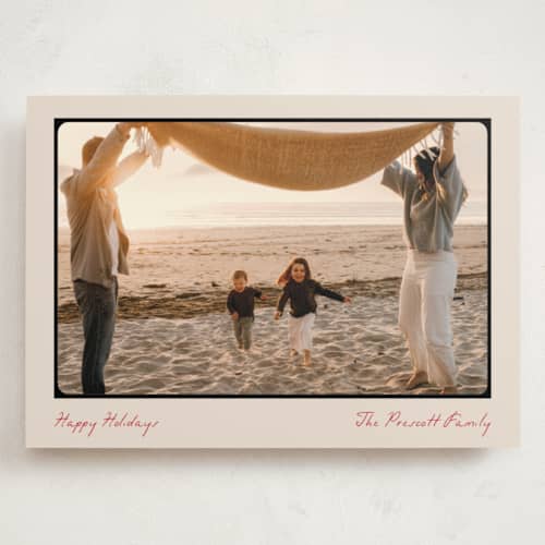 This is a cranberry holiday photo cards with standard by Pixel and Hank called reverie printing on signature in grand