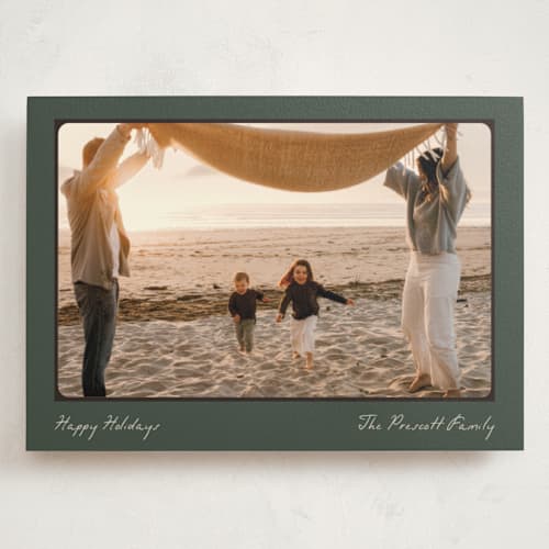 This is a evergreen holiday photo cards with standard by Pixel and Hank called reverie printing on signature in grand