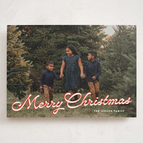This is a poinsettia holiday photo cards with standard by Ekko Studio called retro script printing on signature in grand