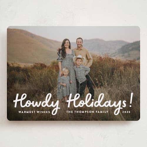 This is a snow holiday photo cards with standard by Megan Davis called howdy holidays printing on recycled smooth signature in grand