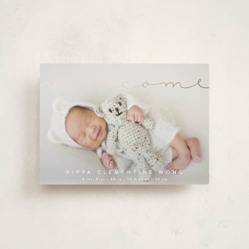 This is a cloud foil stamped birth announcements with foil pressed by Olivia Raufman called delicate welcome printing on recycled smooth signature in petite
