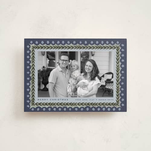 This is a juniper petite holiday cards with standard by Amy Kross called primary printing on recycled smooth signature in petite