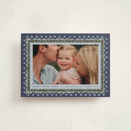 This is a juniper petite holiday cards with standard by Amy Kross called primary printing on recycled smooth signature in petite