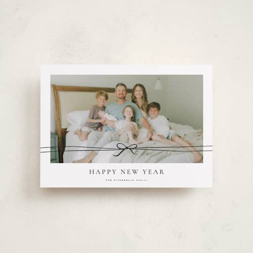 This is a coal petite holiday cards with standard by Wildfield Paper Co called delicate ribbon printing on recycled smooth signature in petite