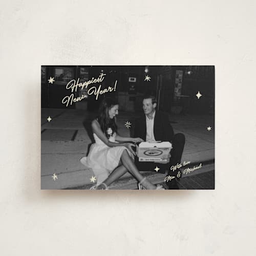 This is a champagne petite holiday cards with standard by Helena Vitto called shiny happy people printing on recycled smooth signature in petite