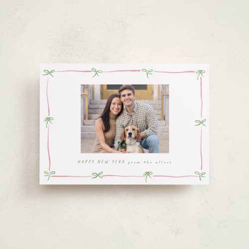 This is a candy petite holiday cards with standard by Susan Zinader called preppy bow border printing on recycled smooth signature in petite