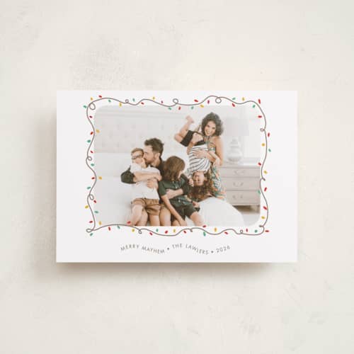 This is a frosting petite holiday cards with standard by Holly Whitcomb called crazy lights printing on recycled smooth signature in petite