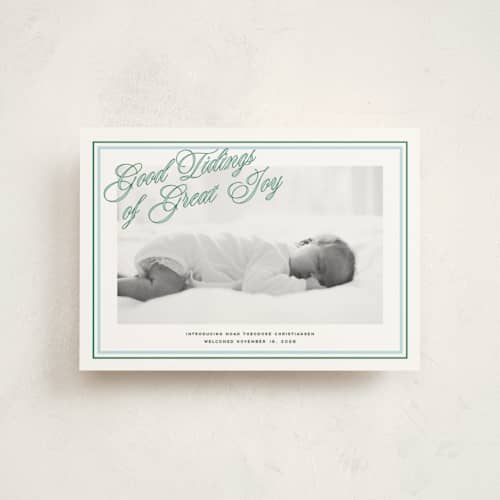 This is a powder babys first christmas with standard by Jenna Holcomb called joyous classic printing on signature in postcard