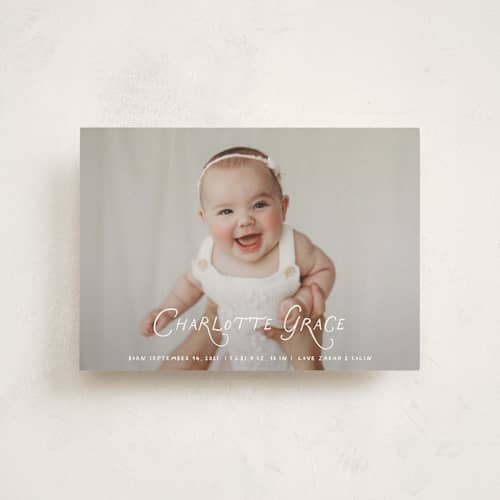 This is a marshmallow petite birth announcements with standard by Benita Crandall called handdrawn style printing on signature in petite