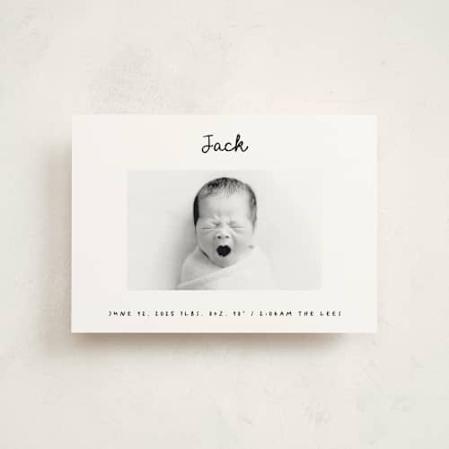 This is a snow birth announcement postcards with standard by AK Graphics called cursive printing on signature in postcard