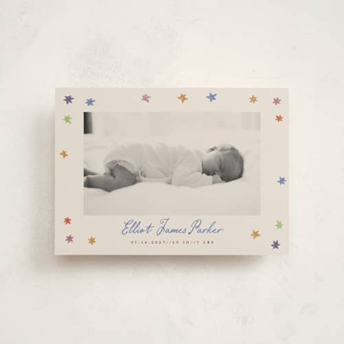 This is a rainbow birth announcement postcards with standard by Maja Cunningham called starlight printing on signature in postcard