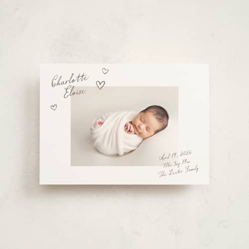 This is a sand birth announcement postcards with standard by Pixel and Hank called written printing on signature in postcard