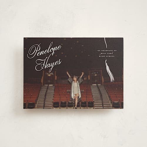 This is a snow graduation announcements with standard by Pixel and Hank called tassel type printing on signature in postcard