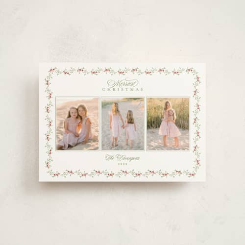 This is a garland petite holiday cards with standard by Susan Moyal called petite holiday vine printing on signature in petite