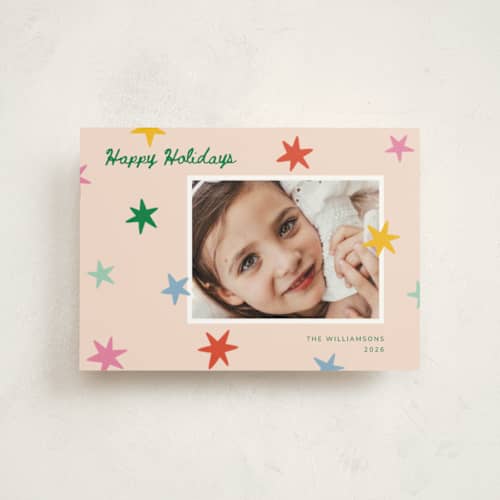 This is a pink sky petite holiday cards with standard by Kristen Magee called star pop printing on signature in petite